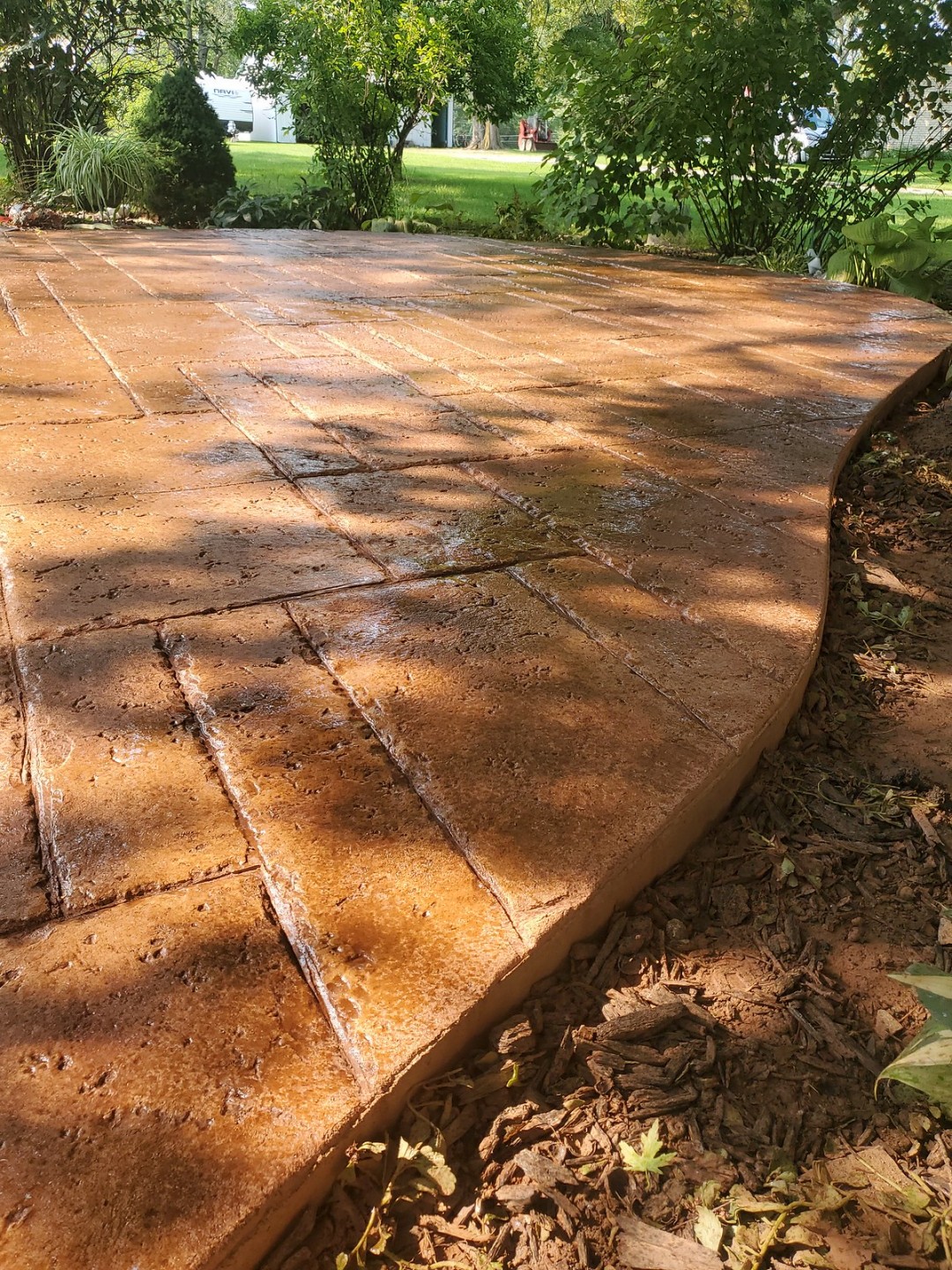 Close-up view of Ashlar Lorenzo Travertine concrete pattern.