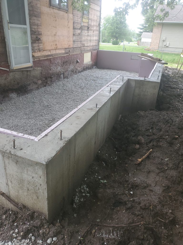 Freshly poured concrete foundation for a home by Ken's Concrete.